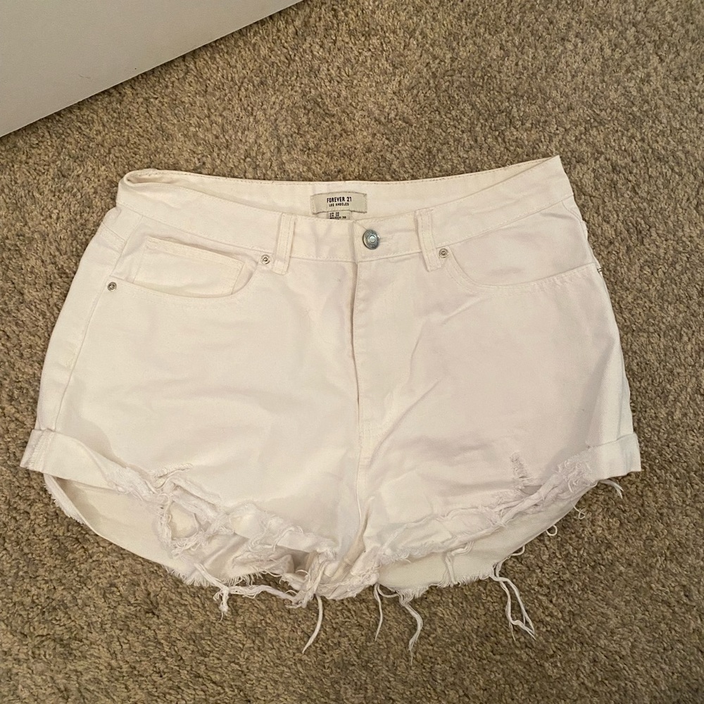 Women’s Forever 21 Mid Rise Jean Shorts. Color white. Size 30.